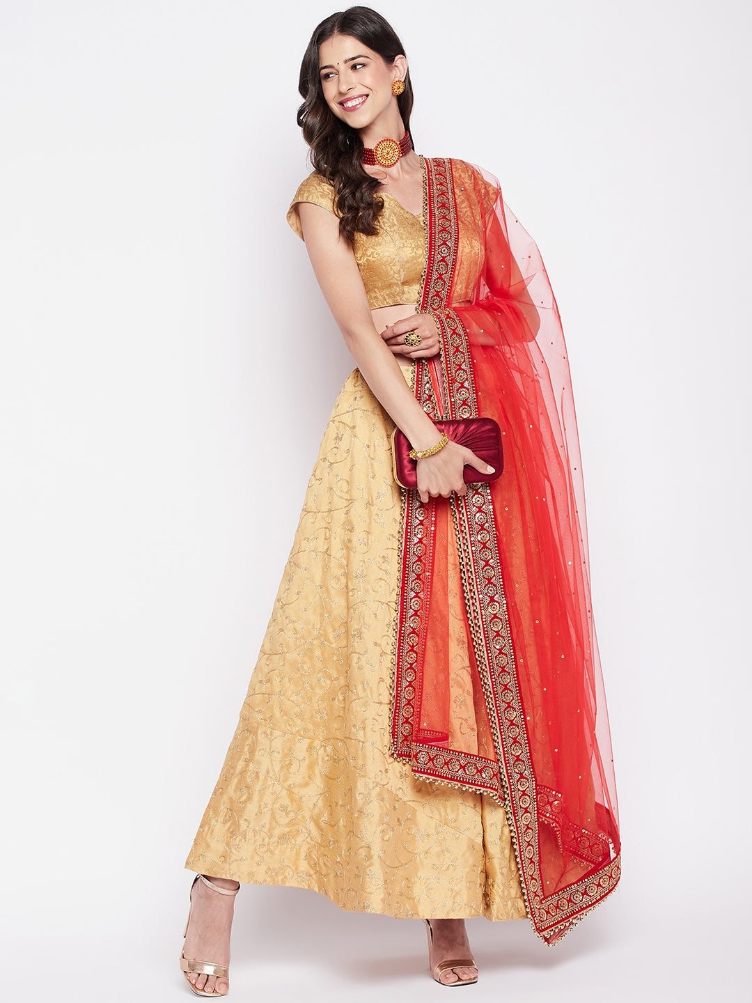 Red embellished net dupatta with sequinned border.