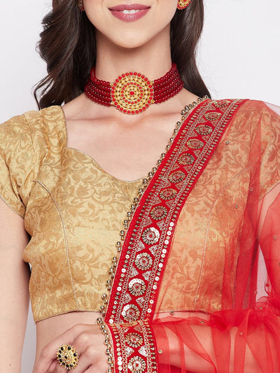 Red embellished net dupatta with sequinned border.