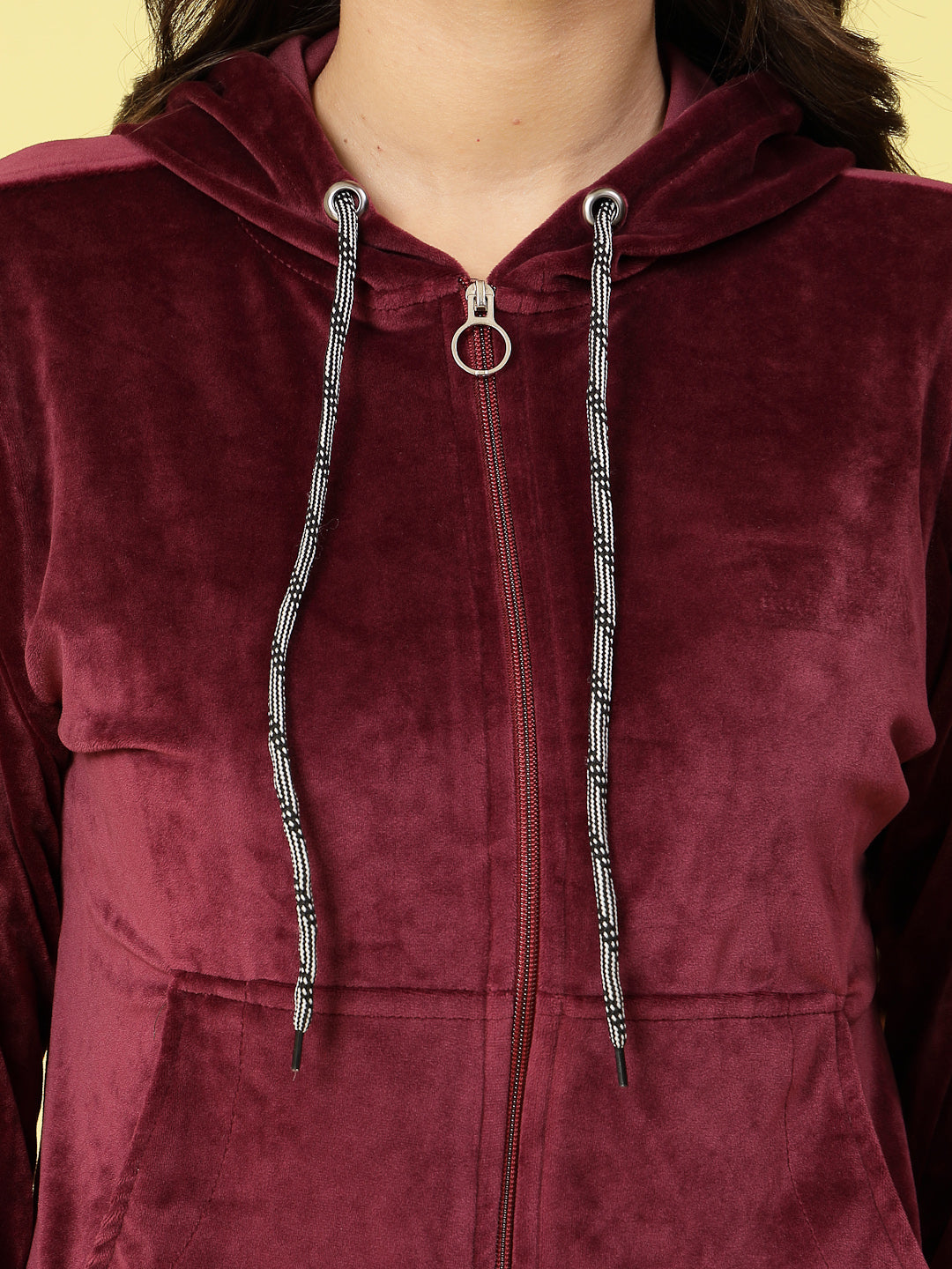 Women solid hooded velvet co-ord set with zip closure and elasticated waistband.