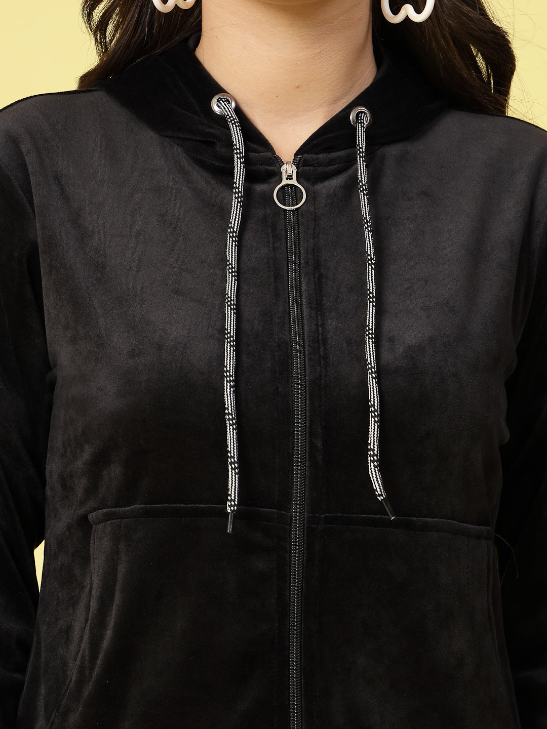 Women solid hooded velvet co-ord set with zip closure.