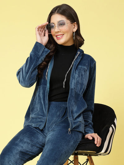 Women solid hooded velvet co-ord set with zip closure and elastic waistband.