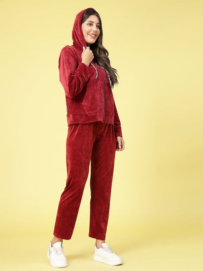 Women solid hooded velvet co-ord set with long sleeves and elastic waistband.