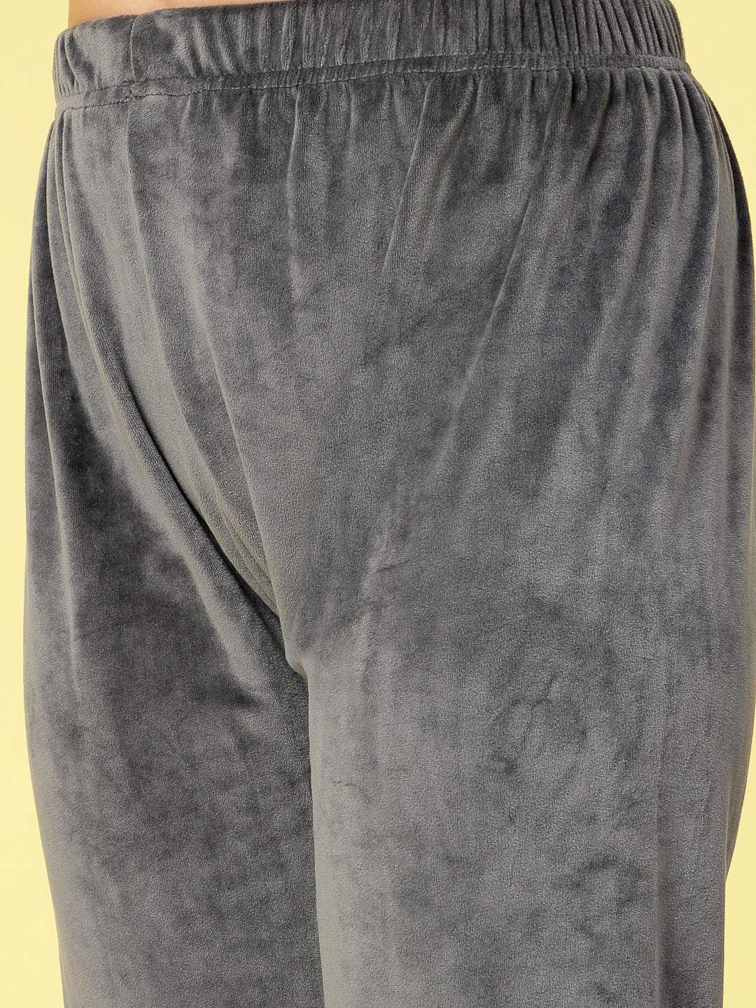 Women solid hooded velvet co-ord set with elasticated waistband and zip closure.