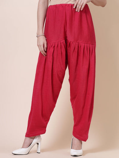 Black & magenta solid woolen salwar pack with drawstring closure.