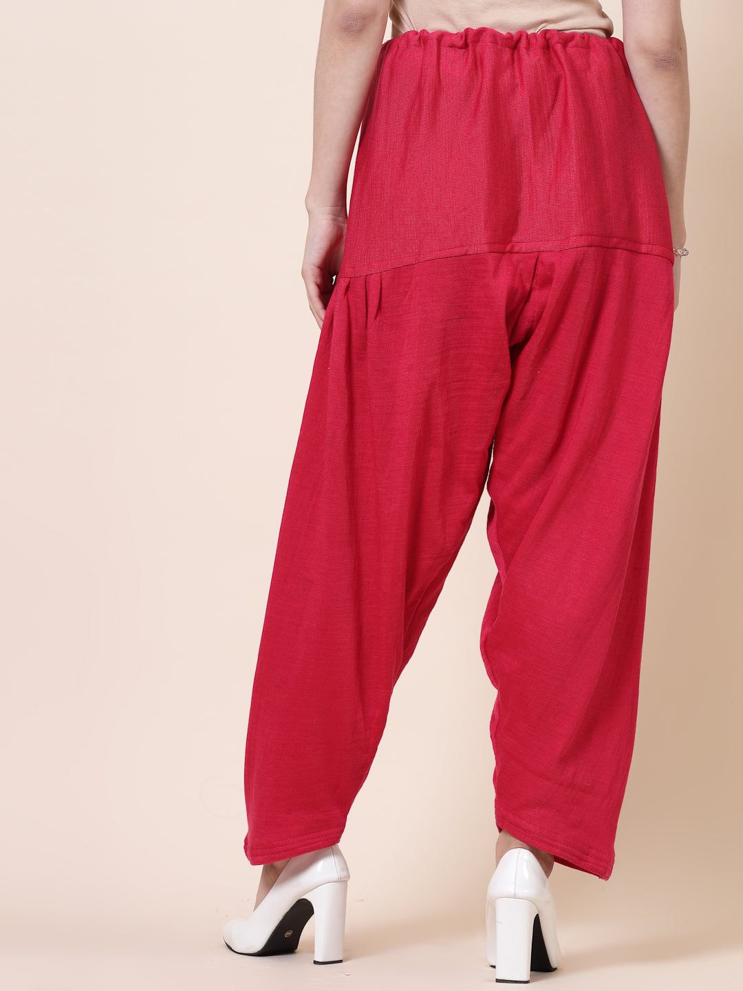 Black & Magenta Solid Woolen Salwar Pack with loose-fit semi Patiala style and drawstring closure.