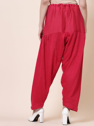 Black & Magenta Solid Woolen Salwar Pack with loose-fit semi Patiala style and drawstring closure.