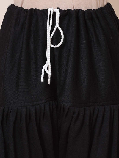 Black & Magenta Solid Woolen Salwar Pack with drawstring closure.