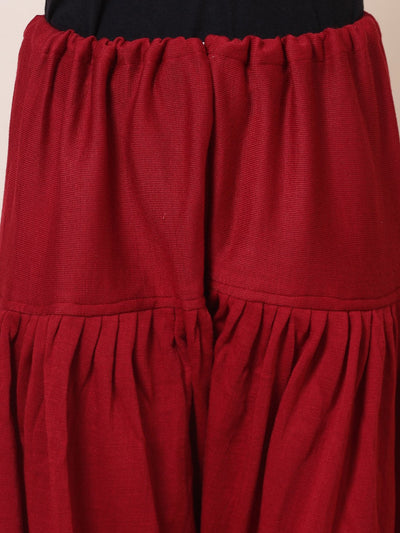 Maroon & red solid woolen salwar pack, loose-fit semi Patiala with drawstring closure.