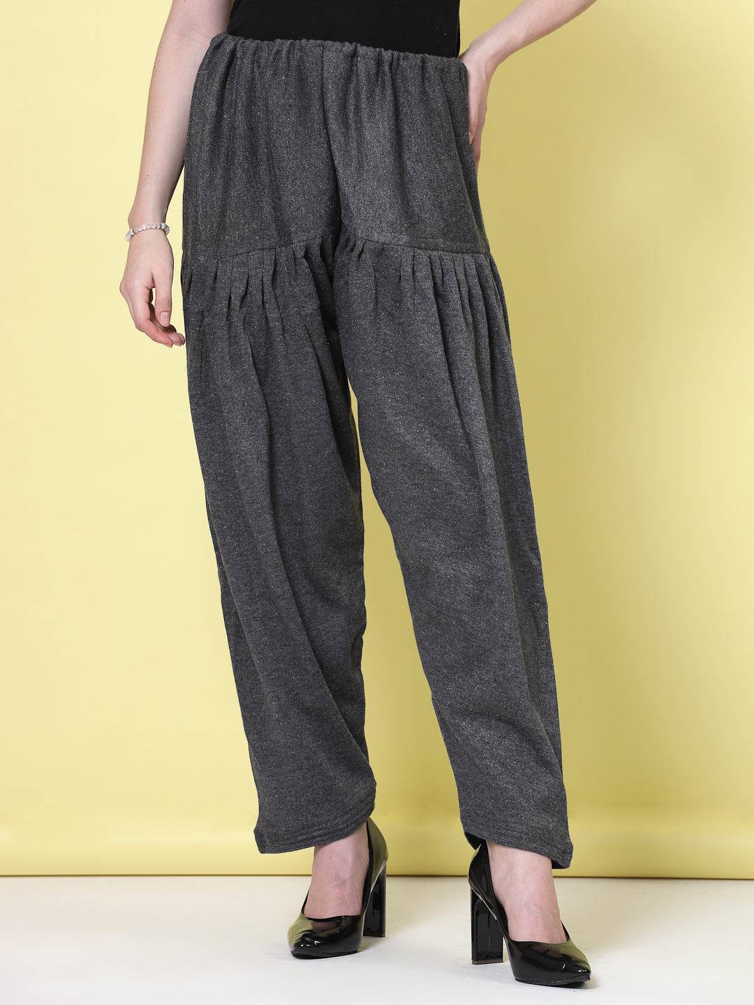 Grey solid woolen salwar with loose-fit and drawstring closure.