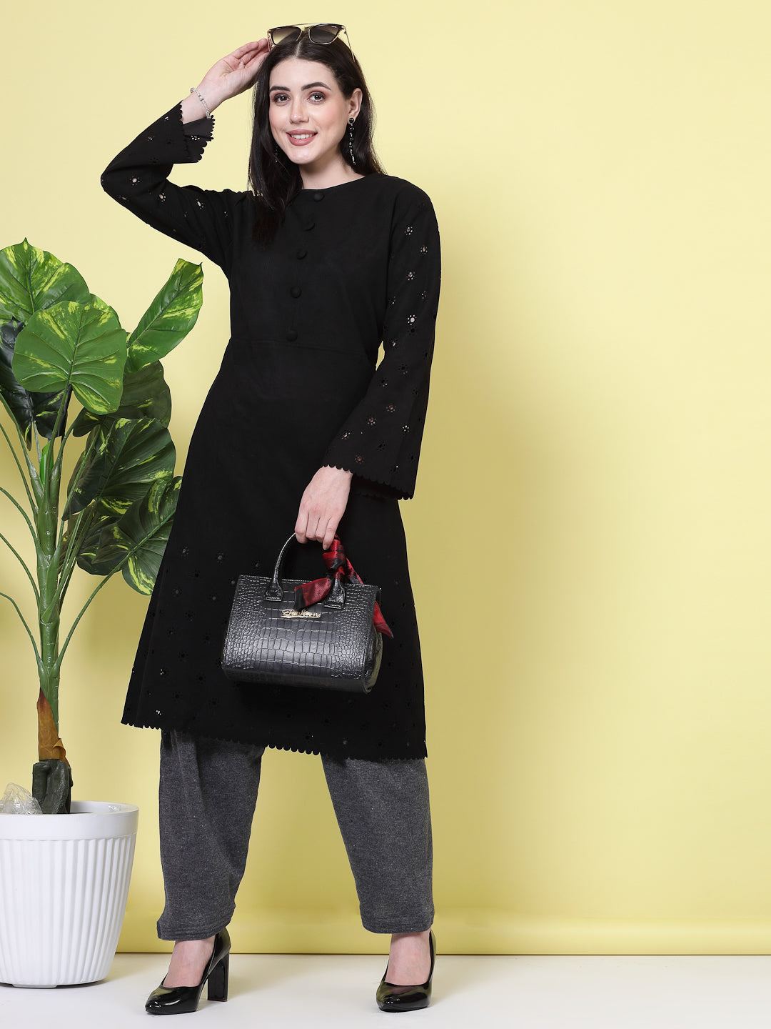Grey and magenta solid woolen salwar pack, featuring loose-fit semi Patiala salwars with drawstring closure.