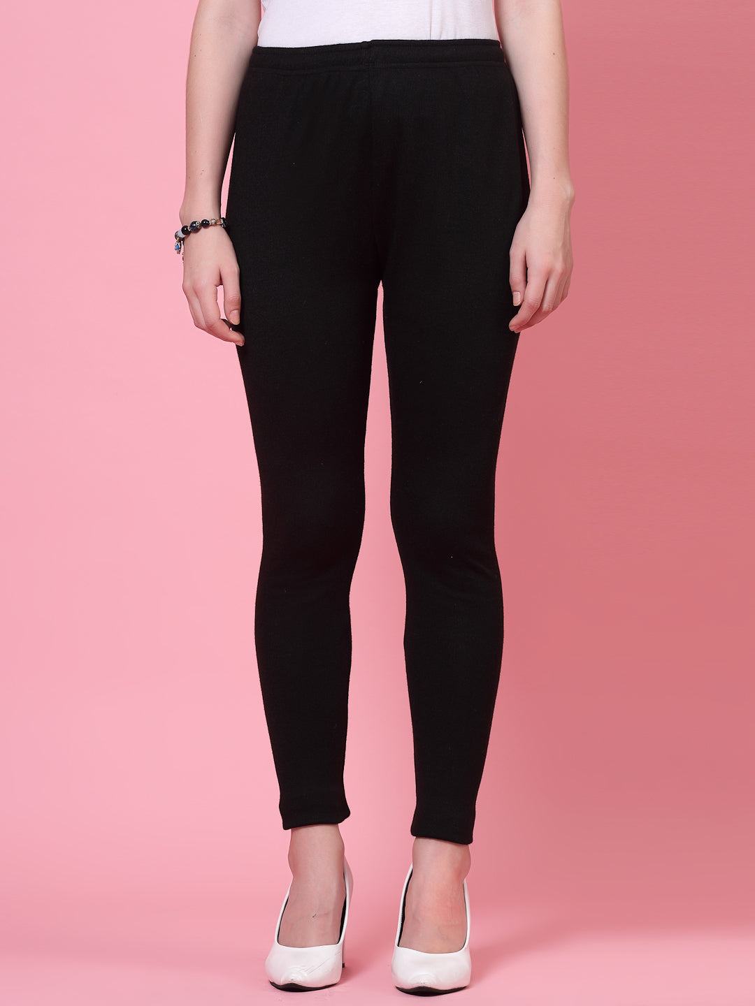 Black woolen leggings with elastic waistband and drawstring closure.