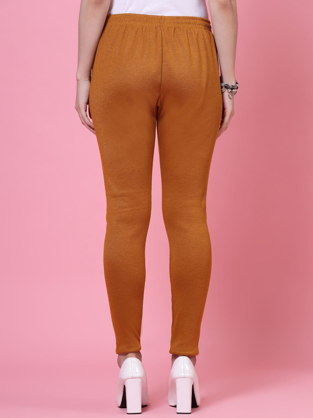 Black and mustard solid woolen leggings with elastic waistband and drawstring closure.