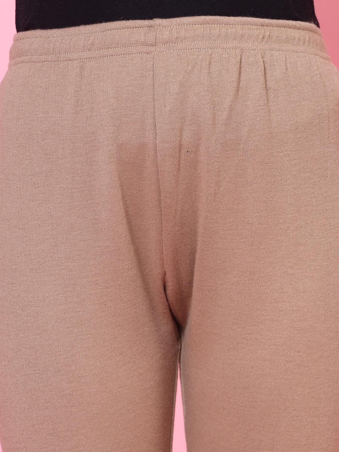 Black and dark fawn solid woolen leggings with elasticated waistband and drawstring.