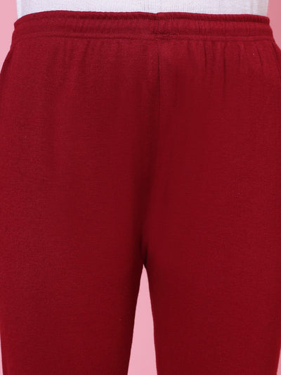 Maroon woolen leggings with elasticated waistband and drawstring closure.