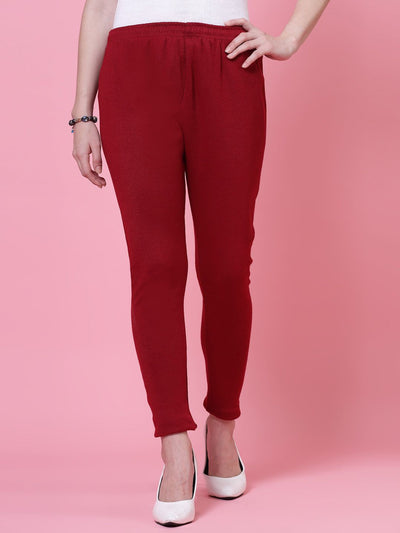 Maroon and red solid woolen leggings with elasticated waistband and drawstring closure.