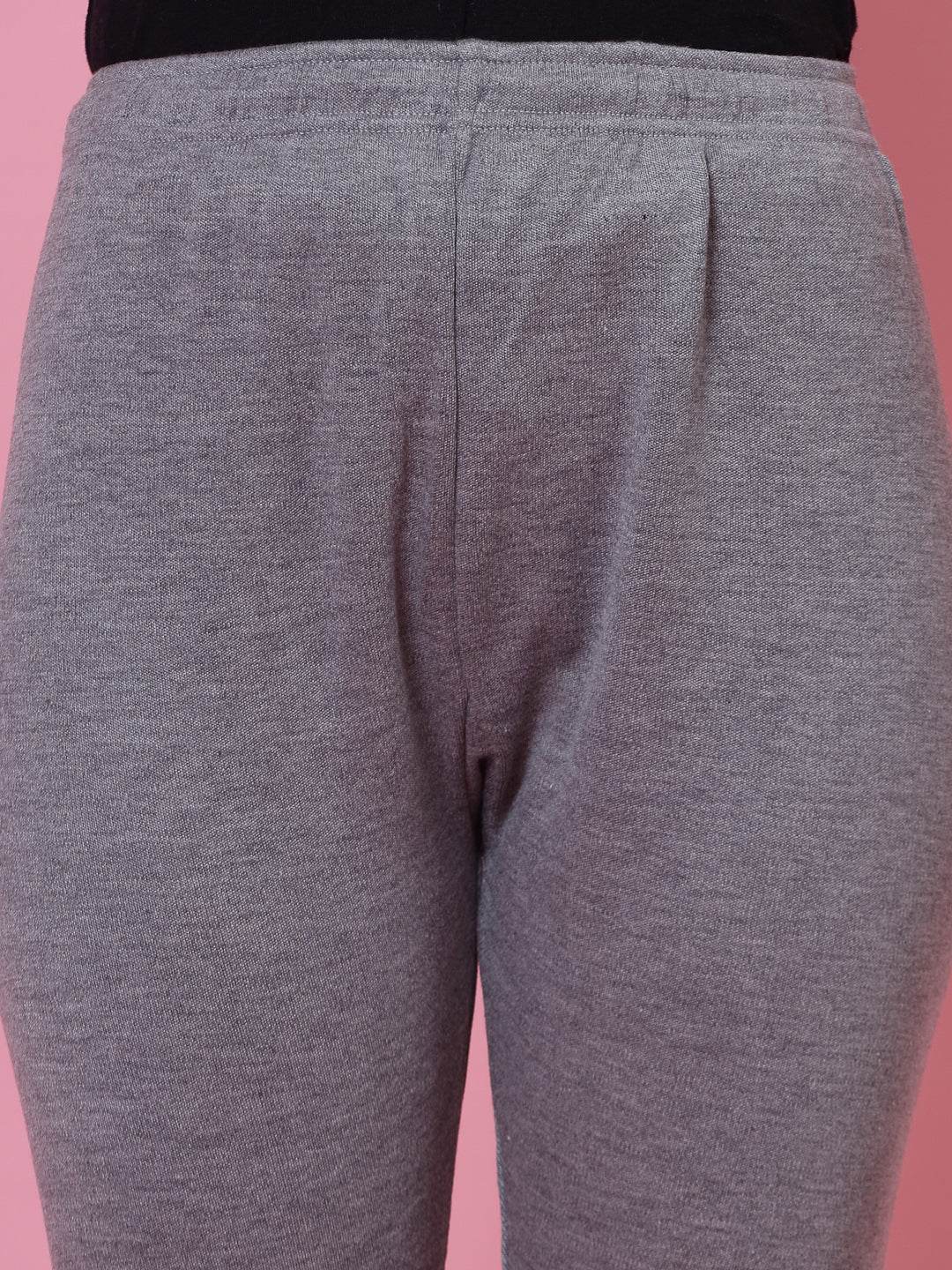 Grey solid woolen leggings with elasticated waistband and drawstring closure.