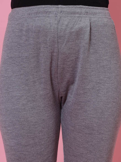 Grey solid woolen leggings with elasticated waistband and drawstring closure.