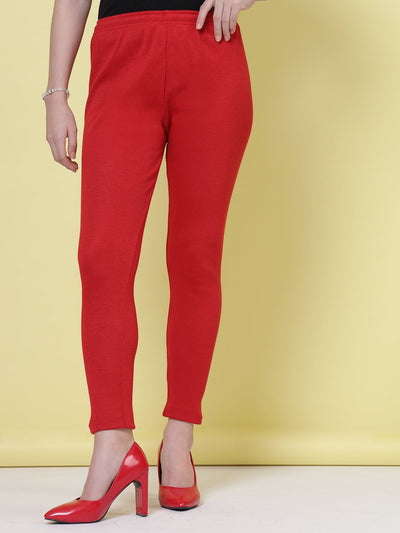 Magenta and red solid woolen leggings with elasticated waistband and drawstring closure.