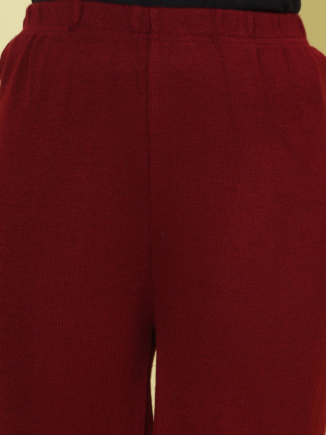 Maroon woolen palazzo with elasticated waistband.