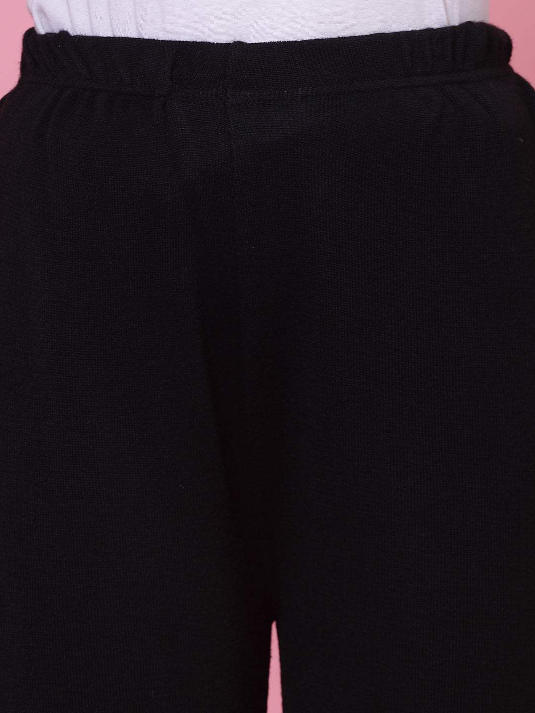 Black and light grey solid woolen palazzo pants with elasticated waistband.