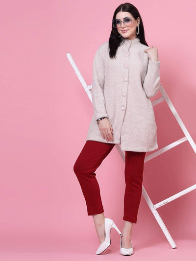 Woman wearing a magenta solid semi Patiala woolen salwar with an elastic waistband and slip-on closure.