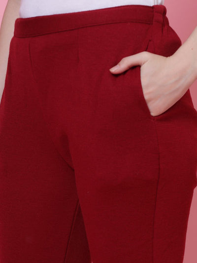 Magenta solid semi Patiala woolen salwar with elasticated waistband.