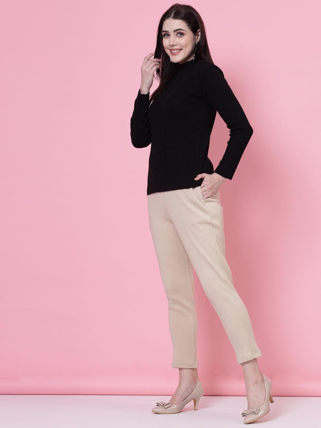 Light fawn solid woolen trouser with elasticated waistband and side pockets, featuring slip-on closure.