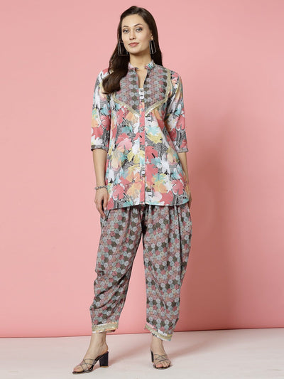 Floral printed embellished Kurti with dhoti pants, peach and black color, three-quarter sleeves, mandarin collar.