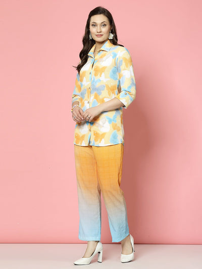 Printed shirt with three-quarter sleeves and ombre effect trousers.