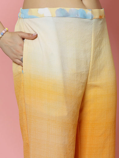 Printed shirt and ombre trousers co-ords set with three-quarter sleeves and elastic waistband.