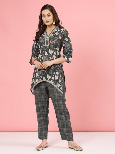 Bottle Green Geometric Printed Kurti with Trousers Set featuring embellished V-collar and curved hemline.