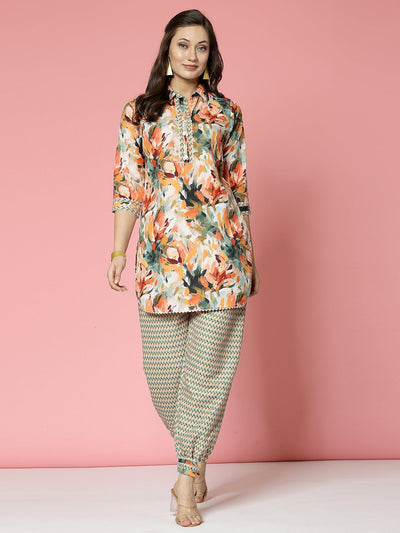 Abstract printed shirt collar kurti with orange and multicoloured design, paired with off-white Afghani pants.