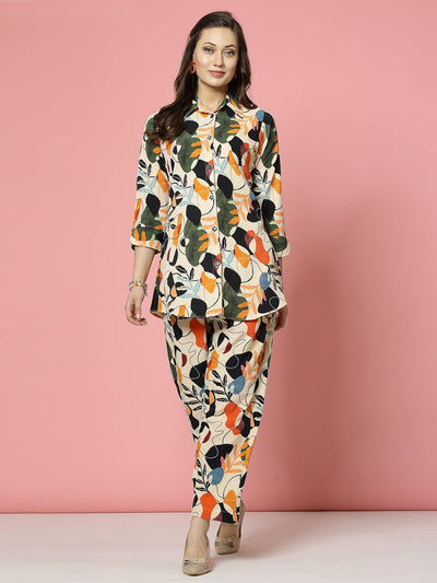 Floral digital printed shirt with trousers co-ords featuring orange and black design, three-quarter sleeves, and straight fit.