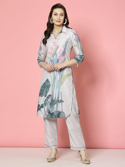 Floral printed shirt collar kurta with trousers set in light beige and green.