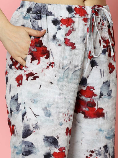 Grey floral printed shirt with trousers co-ords featuring red and maroon patterns, puff sleeves, shirt collar, and straight-fit trousers with drawstring closure.