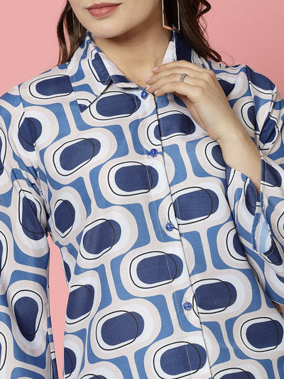 Geometric printed shirt with bell sleeves and collar.