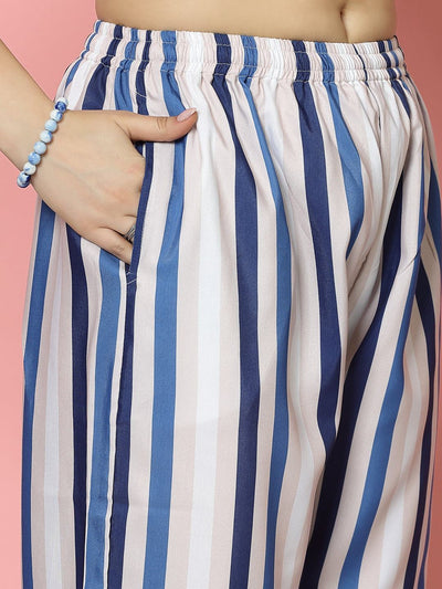 Geometric printed shirt and striped trousers co-ords with bell sleeves and elasticated waistband.