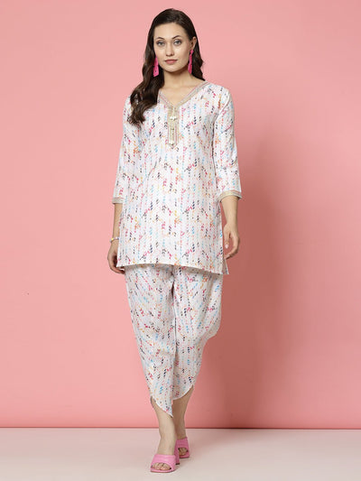 Geometric digital printed tunic top with dhoti pants, off-white and multicolored, V-neck and three-quarter sleeves.