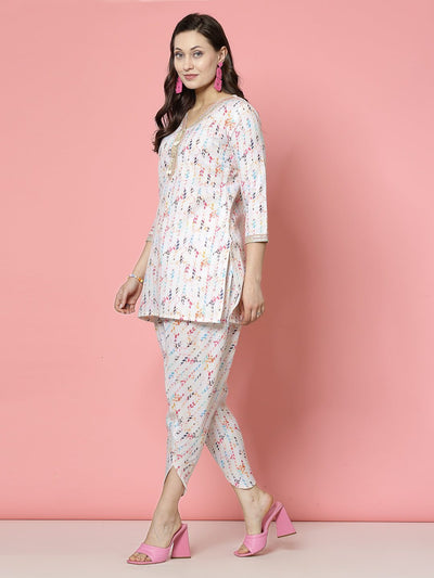 Geometric digital printed tunic top with dhoti pants in off-white and multicolor, V-neck, three-quarter sleeves.