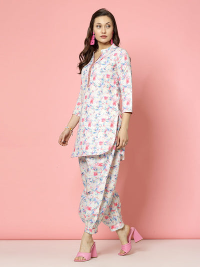 Abstract digital printed tunic top with Afghani pants, featuring a mandarin collar and multicolored design.