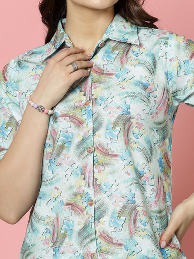 Abstract printed shirt with three-quarter roll-up sleeves and collar.