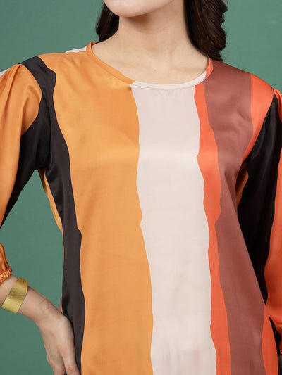 Geometric printed tunic with orange and black stripes, three-quarter sleeves, and round neck.