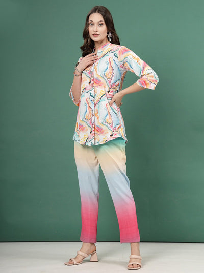 Pink ombre design printed shirt with blue and pink abstract patterns, three-quarter sleeves, and matching ombre trousers.