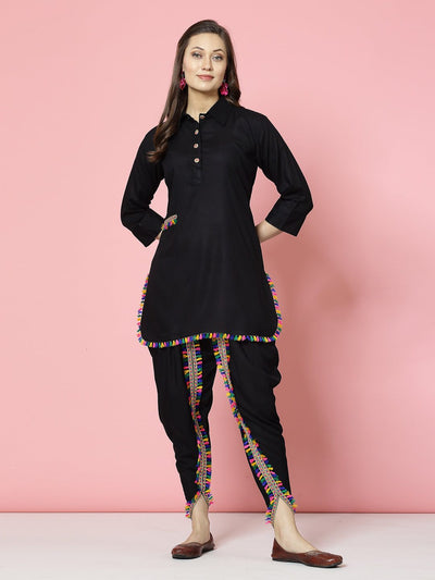 Embellished shirt collar kurti with black dhoti pants, three-quarter sleeves, and colorful border.