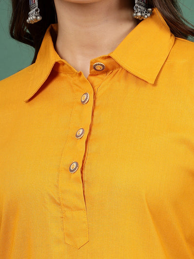 Embellished mustard kurti with shirt collar and button closure.