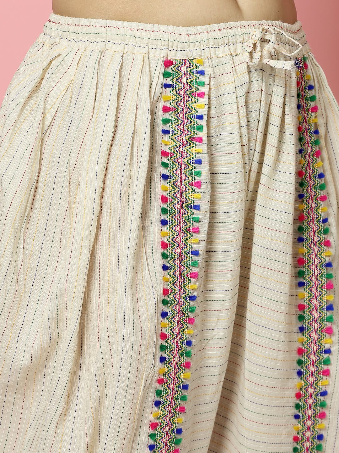 Kantha work dhoti pants with multicoloured embellishments and elasticated waistband.