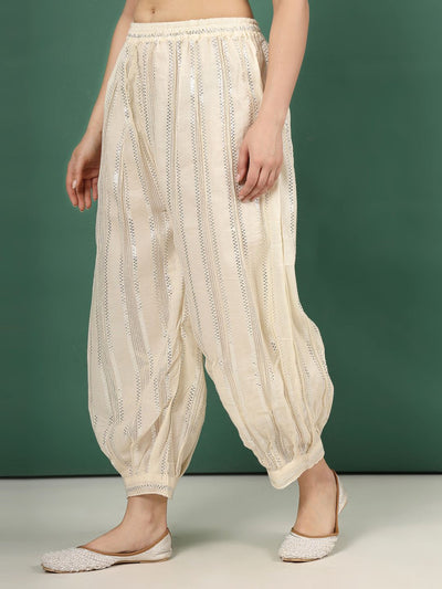 Self design loose fit cotton Afghani salwar with Lurex details.