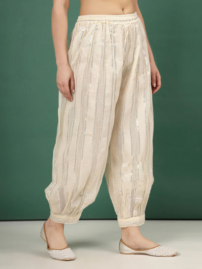 Design Loose Fit Cotton Afghani Salwar with Lurex threads for a traditional yet contemporary look.