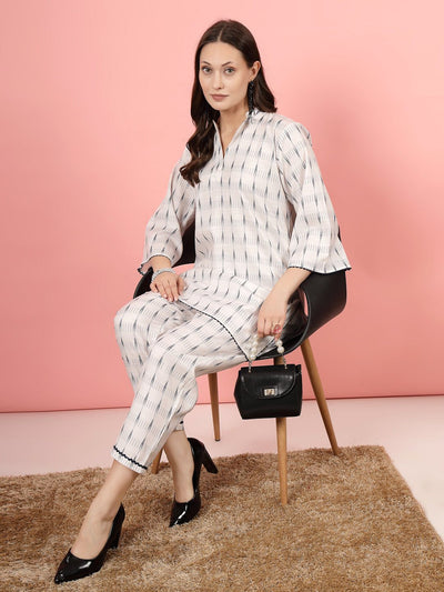 Ikat printed shirt collar kurti with palazzo set in white and navy, high-low hemline.