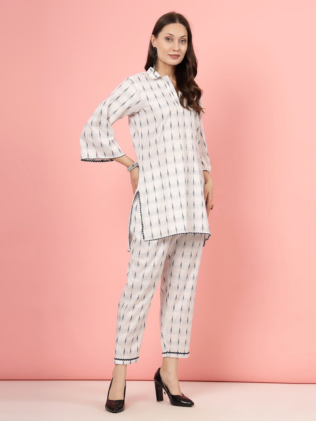 Ikat printed shirt collar kurti with high-low hemline and matching palazzo set.